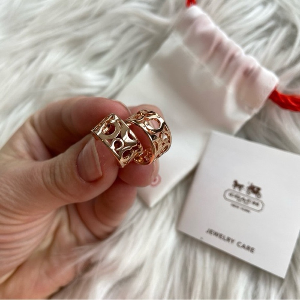 New Coach rose gold tone C logo earrings